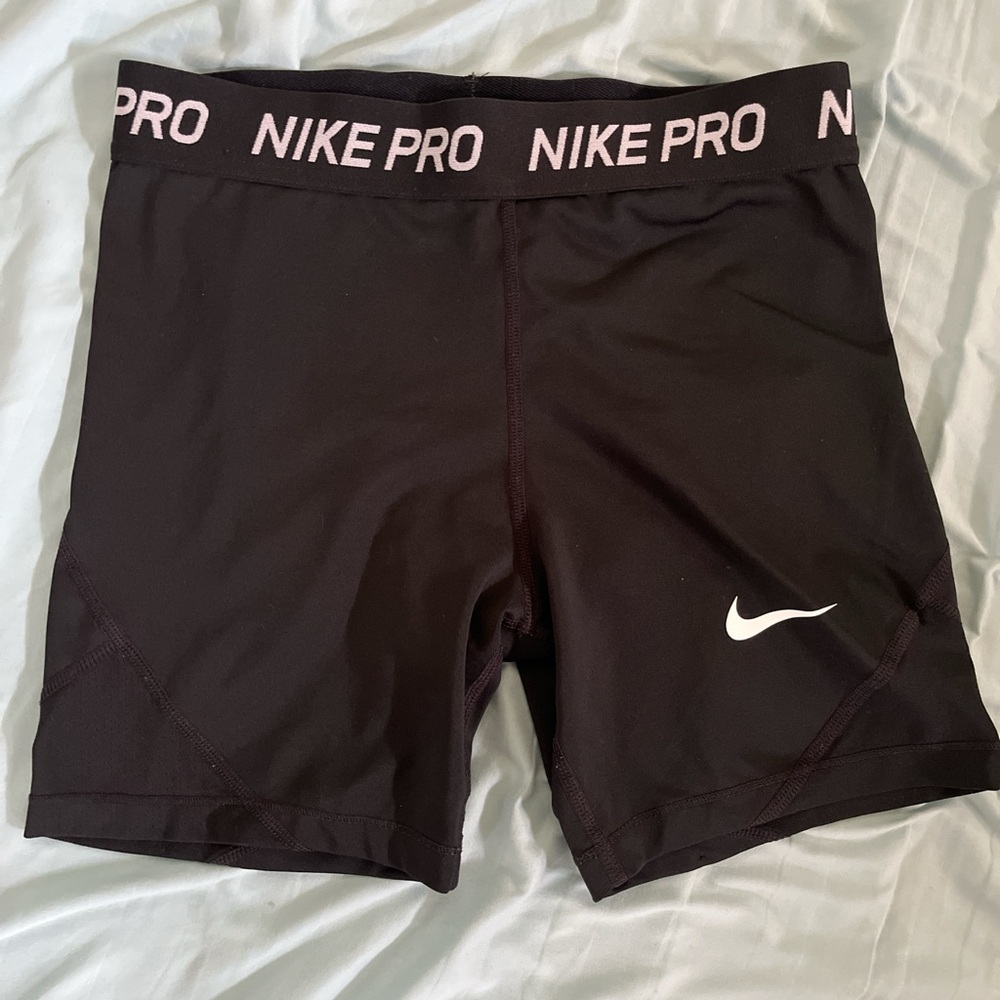 Nike pro shorts size XL pretty snug